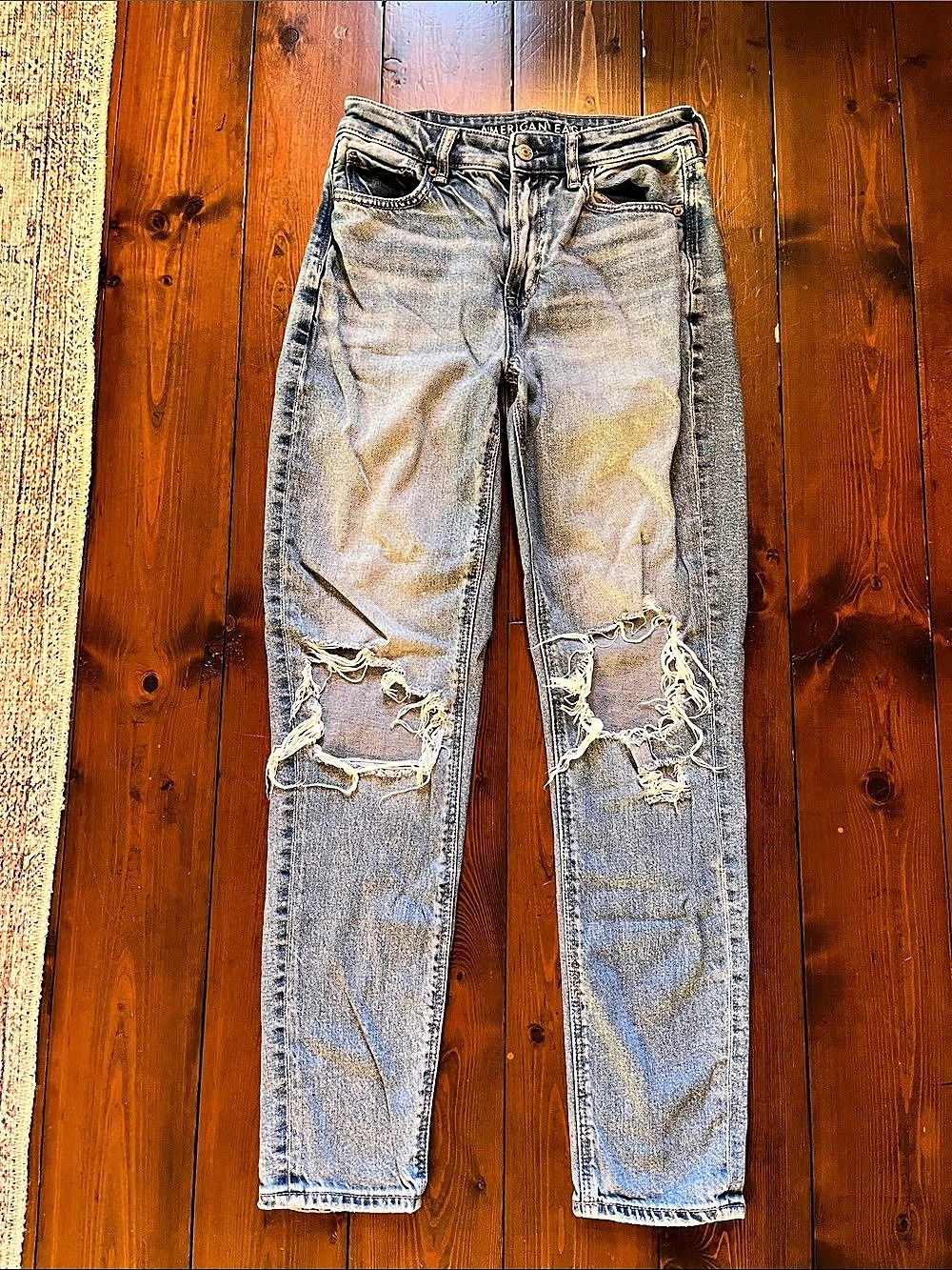 American Eagle Distressed Strigid Jeans light wash in size 0